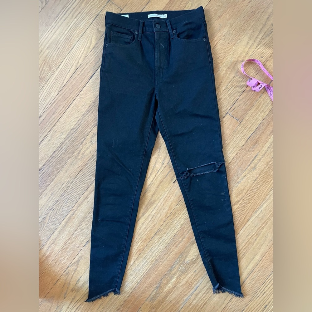 Levi’s mile high super skinny size 28. Minimal wear, still dark black.